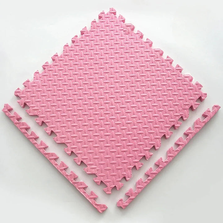 Single pink foam puzzle tile with a leaf-vein texture and two separate edge border strips.