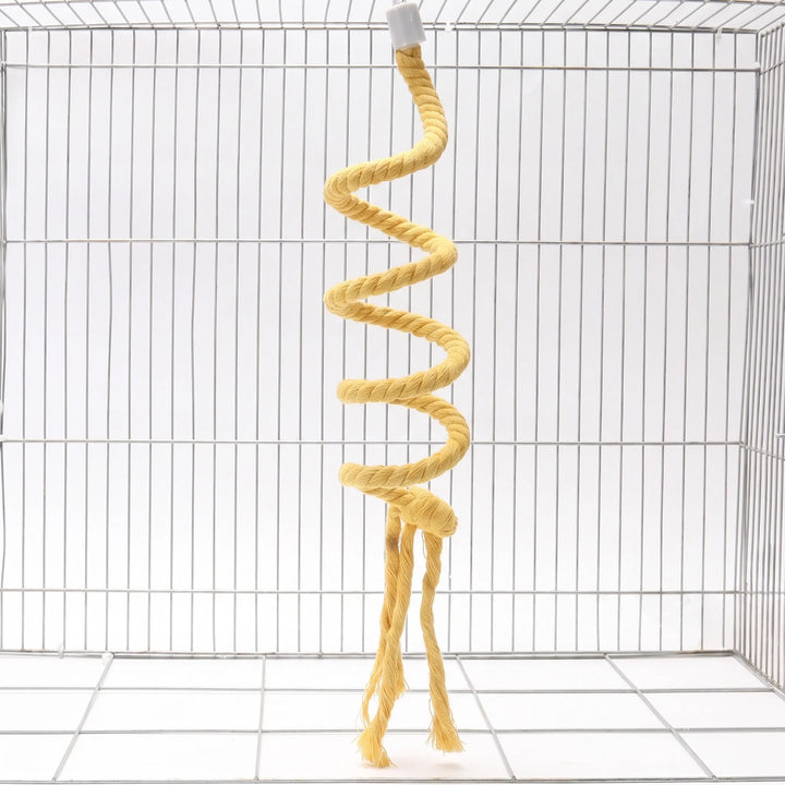 Yellow rope spiral perch with a knot and three loose tassel ends, hanging in an empty wire cage. 4