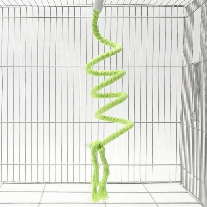Light green version of the spiral rope perch hanging in a wire cage, with a knot and frayed ends. 5