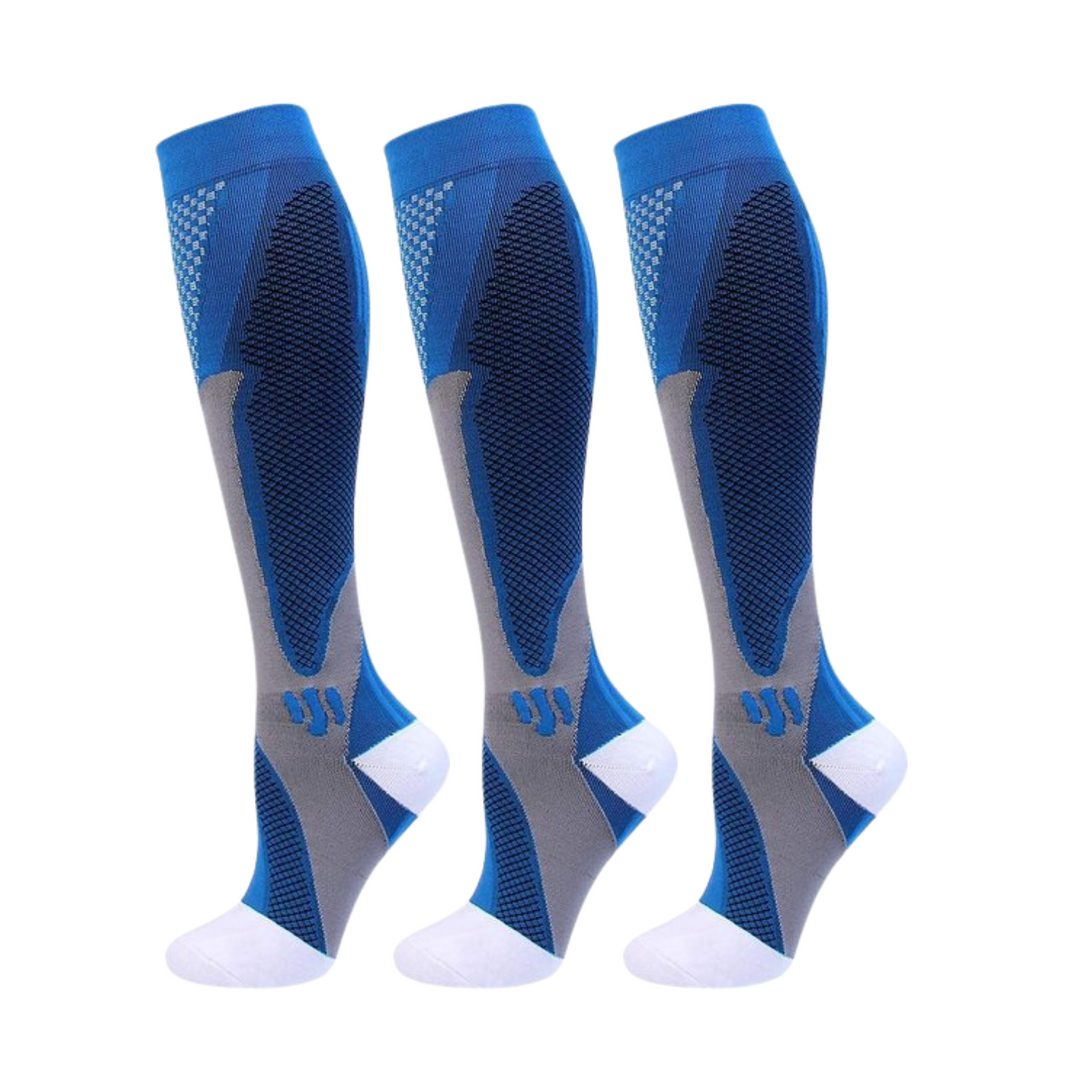 Three identical blue knee-high compression socks with gray ankle panels, dark mesh calf texture and white heel and toe. 7