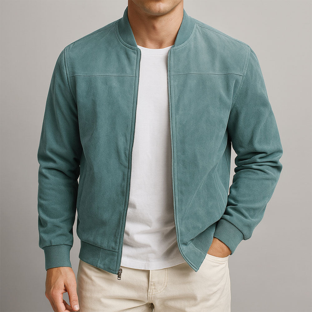 Men's bomber jacket in teal-green, another view, worn open over a white t-shirt with cream pants.