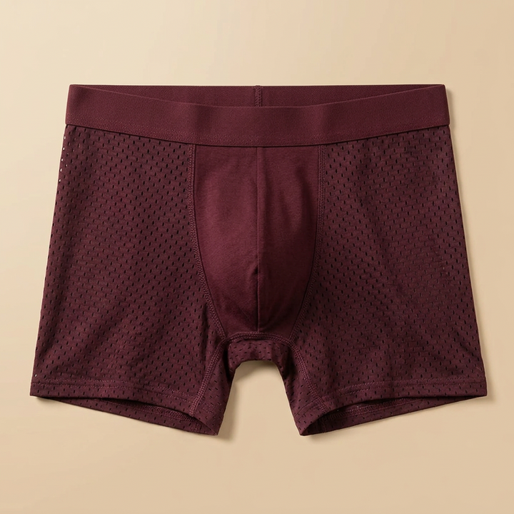 Burgundy boxer briefs laid flat, showing the waistband, stitched center panel and mesh side panels 7