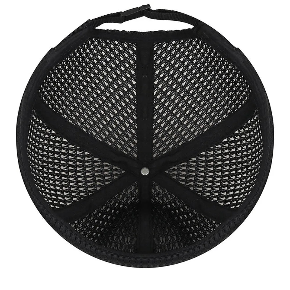 Inside view of the black open weave cap, showing the seam panels, center button and adjustable strap 11