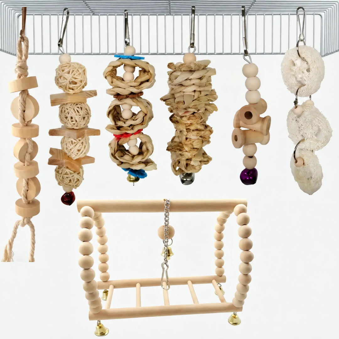 Natural wood bird toys hanging from a cage roof, with rattan balls, woven corn husk, loofah slices, a rope chew and a beaded swing. 6