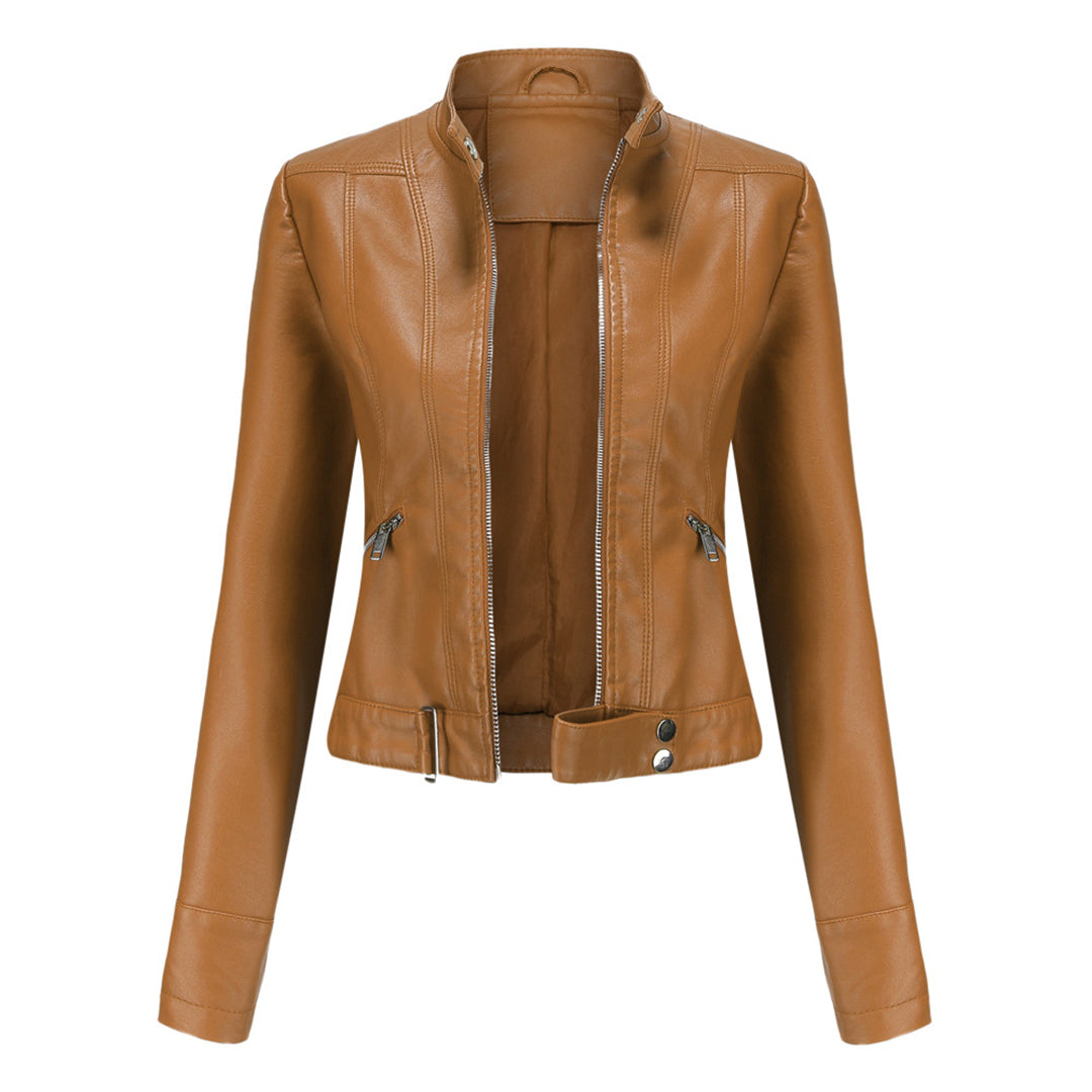 Front view of the tan camel-colored cropped jacket, unzipped, showing zippered pockets and a snap-closure waist tab. 5