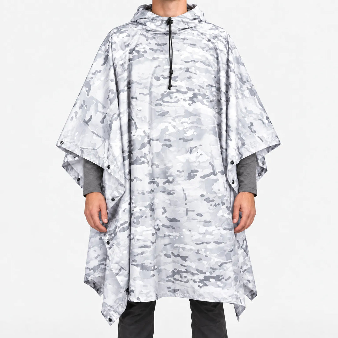 Front view of a hooded poncho in white and light gray snow camouflage with a black drawcord at the hood. 11