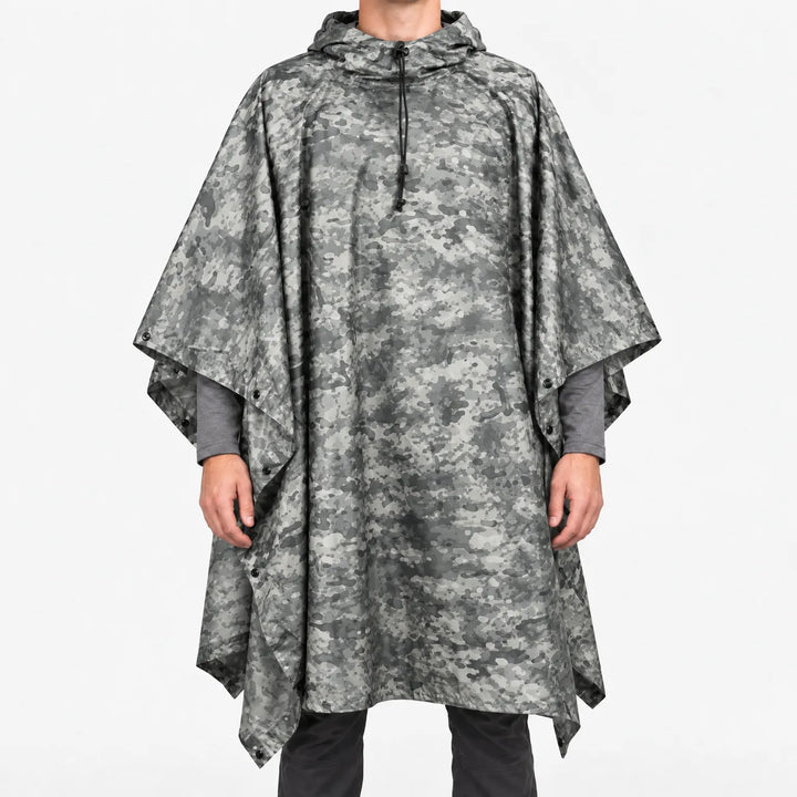 Front view of a hooded poncho in gray digital-style camouflage with small speckled patterns, worn over a gray long-sleeve shirt. 12