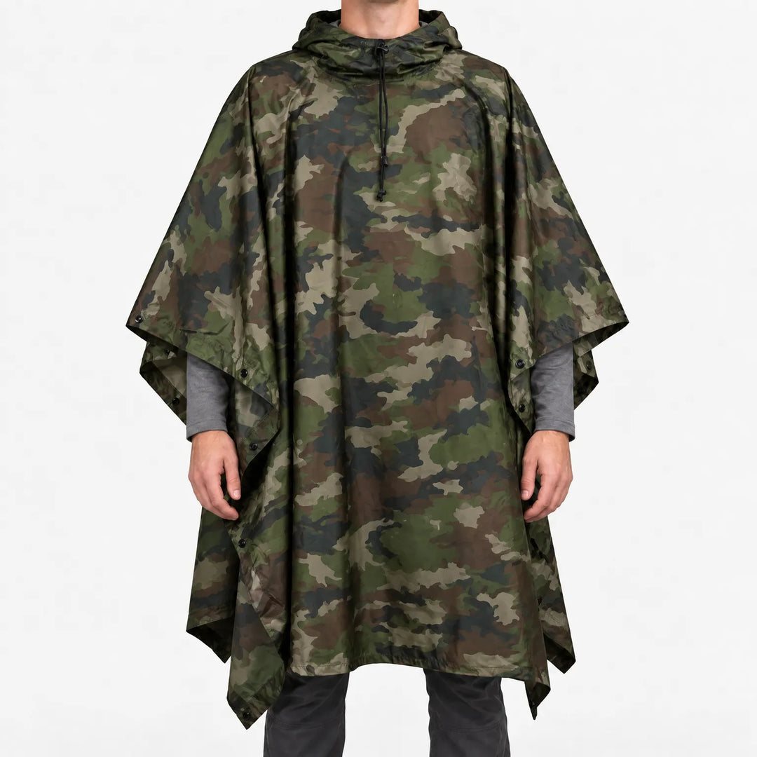 Front view of a hooded poncho in classic woodland camouflage with large olive green, brown, tan and black patches. 14