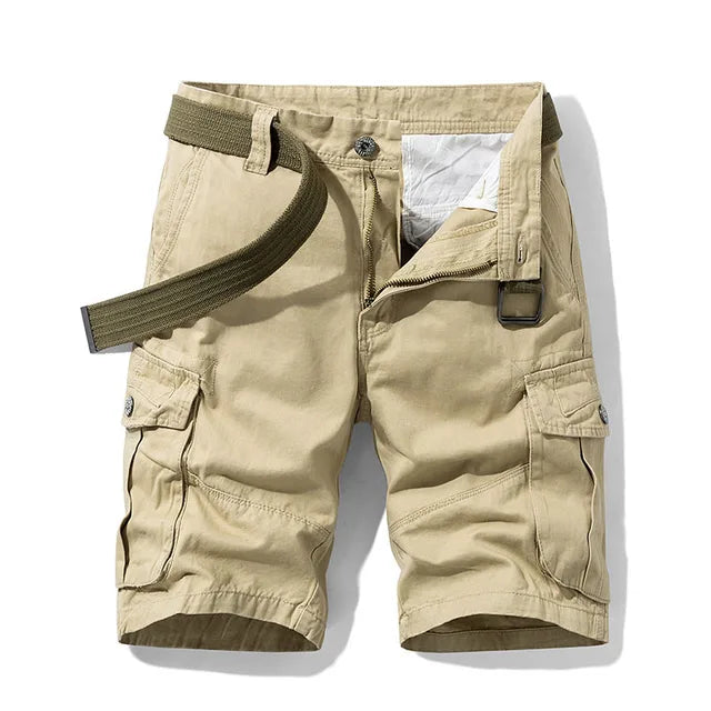 Khaki cargo shorts with an olive green woven belt and large side pockets.