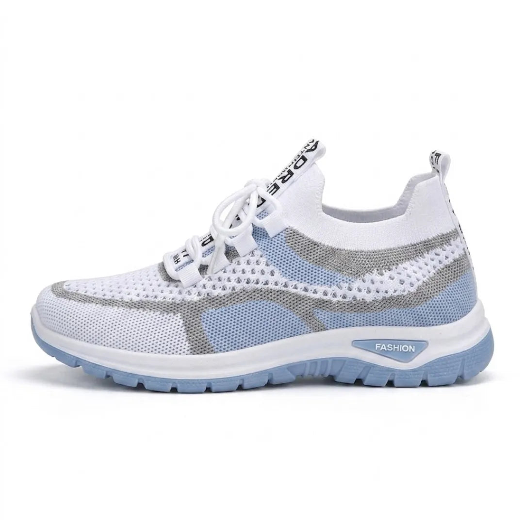 White and light blue mesh knit sneaker with gray accents, a thick white midsole and blue outsole.