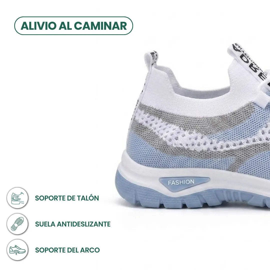 Close-up of the heel of the light blue sneaker, with icons highlighting heel support, a non-slip sole and arch support. 4