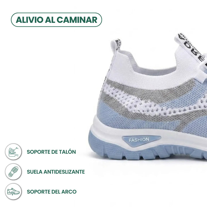 Close-up of the heel of the light blue sneaker, with icons highlighting heel support, a non-slip sole and arch support. 4