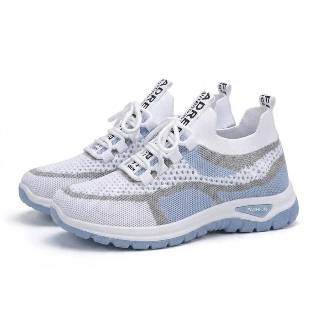 Pair of white and light blue mesh sneakers with white laces, gray trim and a light blue outsole.
