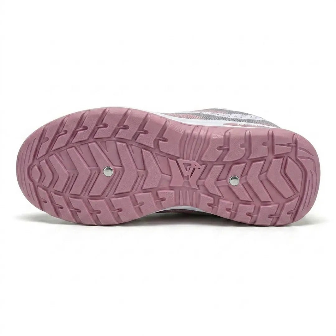 Bottom view of a sneaker showing the pink rubber outsole with deep chevron treads, two small metal studs and a white midsole edge. 27