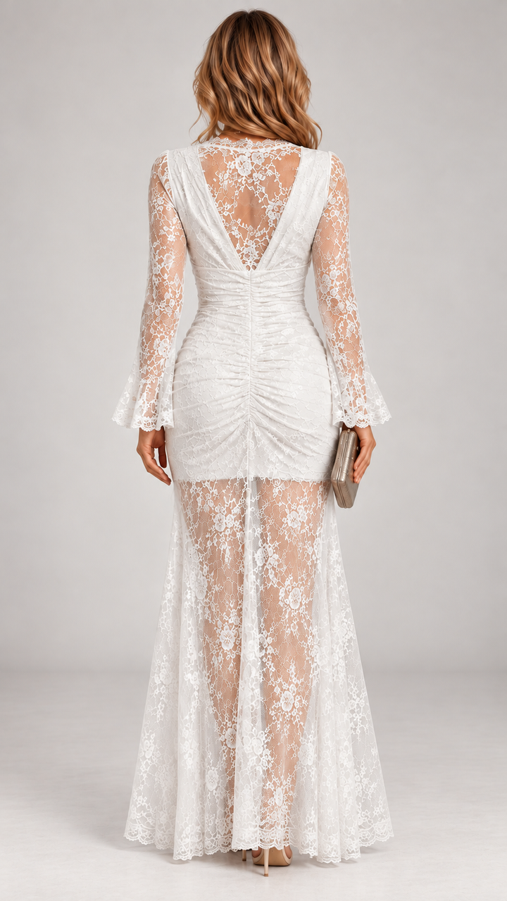 White lace maxi dress back detail with an open V-shaped lace back, ruched hip section and sheer lace skirt.