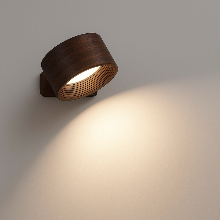 Black wireless LED wall light, another view, with a dark brown wood-look finish and ribbed reflector.