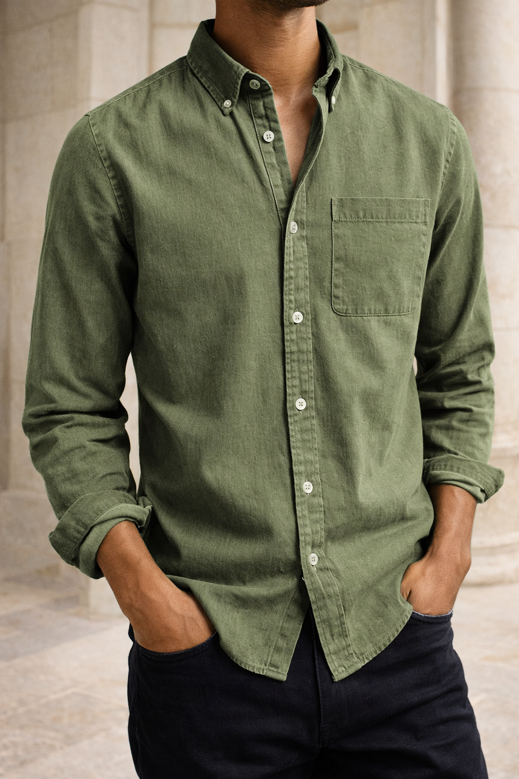 Men's cotton button-down shirt in green with a chest pocket and rolled sleeves, another view.