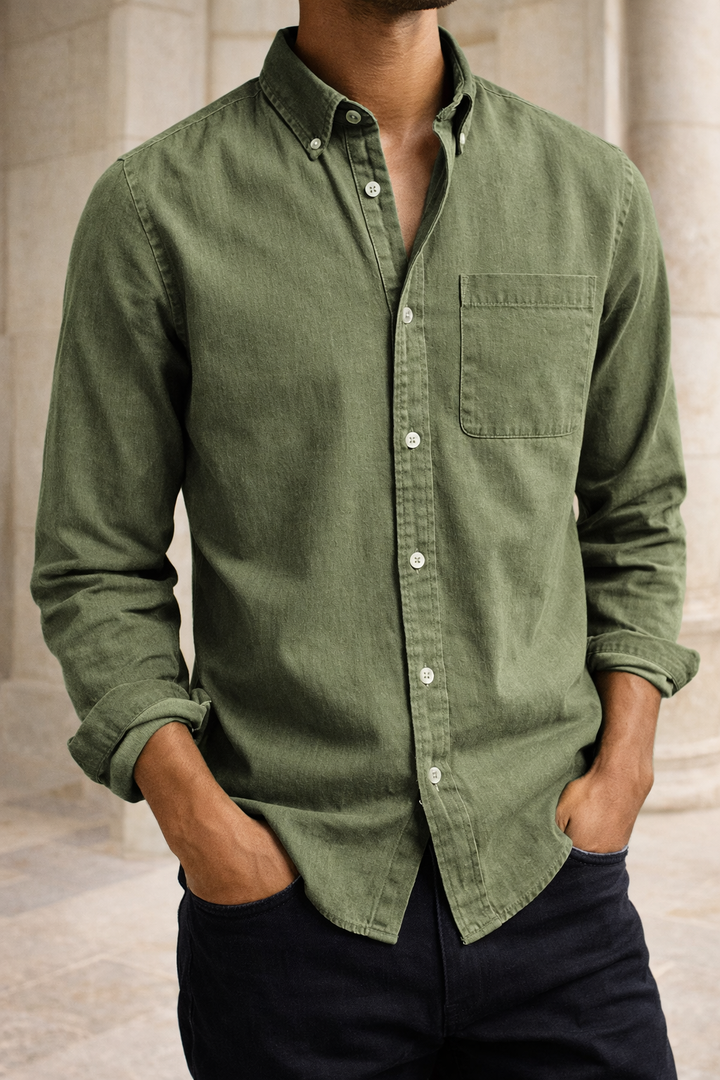 Men's cotton button-down shirt in green with a chest pocket and rolled sleeves, another view.