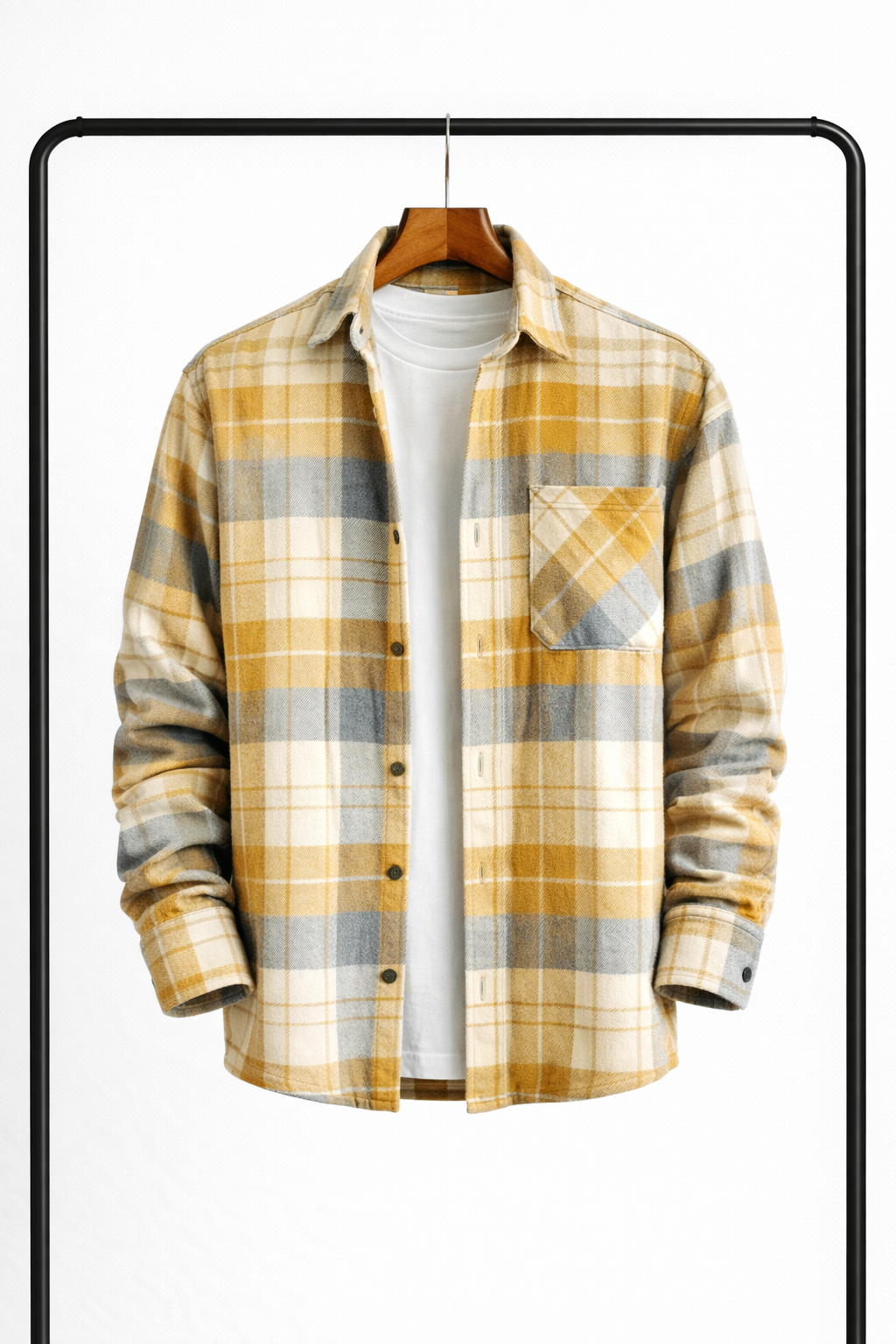 Yellow, gray and cream plaid overshirt hanging open over a white tee with a chest pocket.