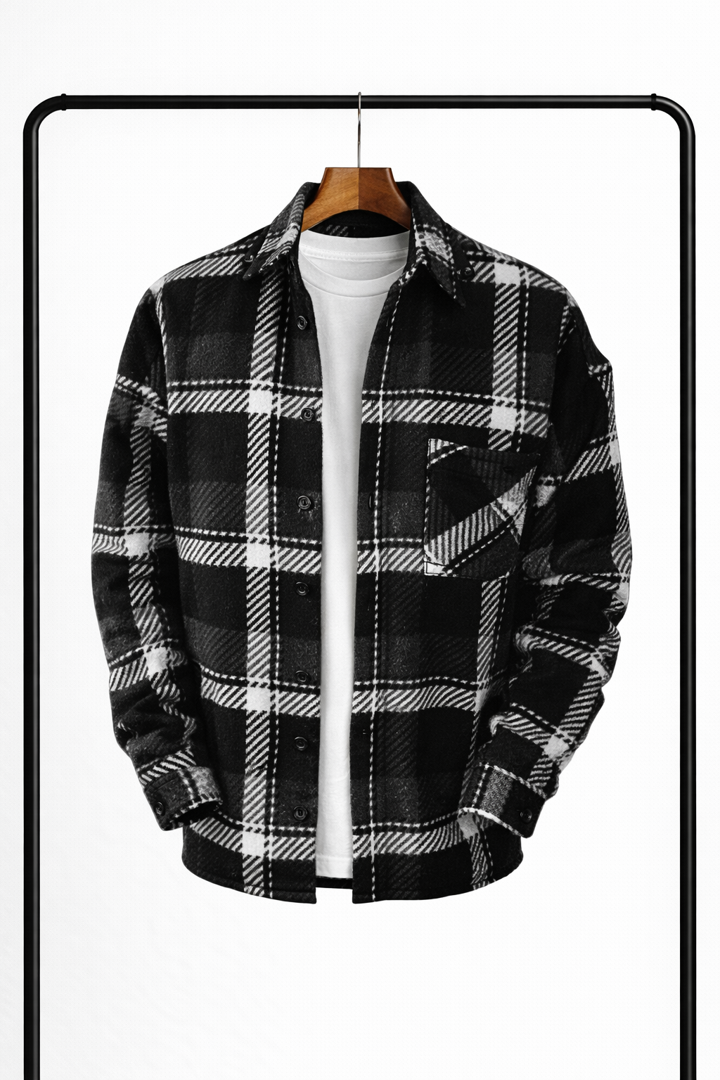 Black, white and gray plaid overshirt hanging open over a white tee with a chest pocket.