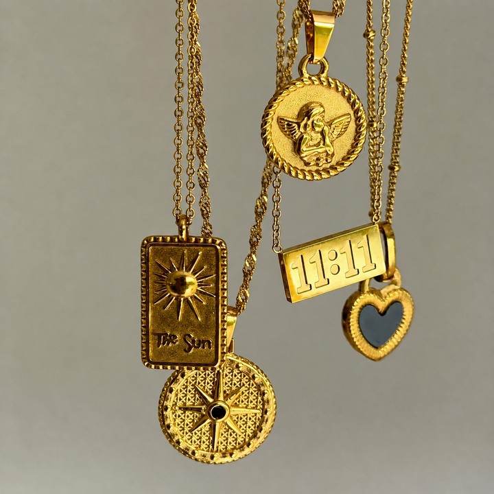 Lucky Elevens Necklace another view with several gold pendant necklaces together.