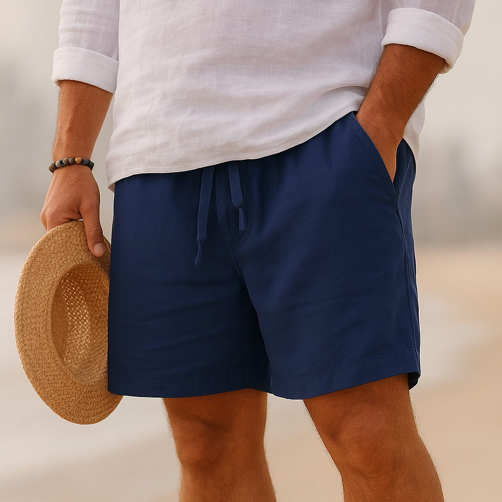 Lorenzo men's cotton-linen shorts in navy blue worn with a white shirt, detail.