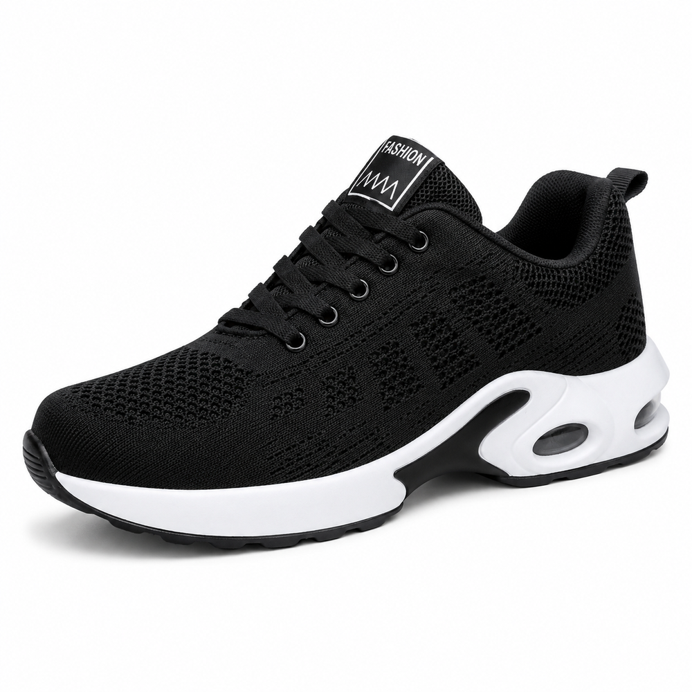 Side view of a black mesh lace-up sneaker with a thick white sole and a transparent air cushion window in the heel. 2