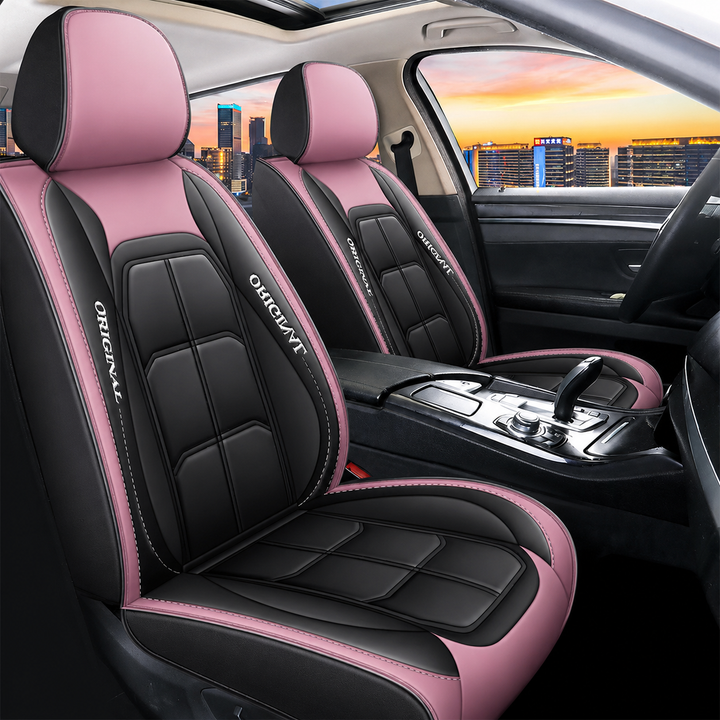 Pair of black front seat covers with pink headrests and pink side panels in a larger car interior view.