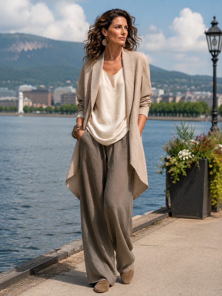 Model wearing all three pieces outdoors on a lakeside promenade, another view.