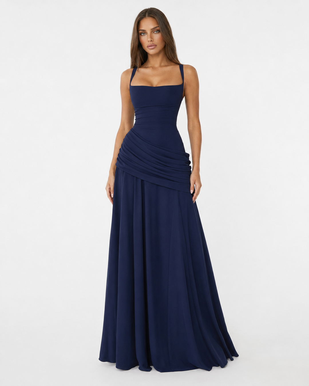 Front view of a navy blue maxi dress with square neckline, gathered diagonal waist drape and flowing skirt