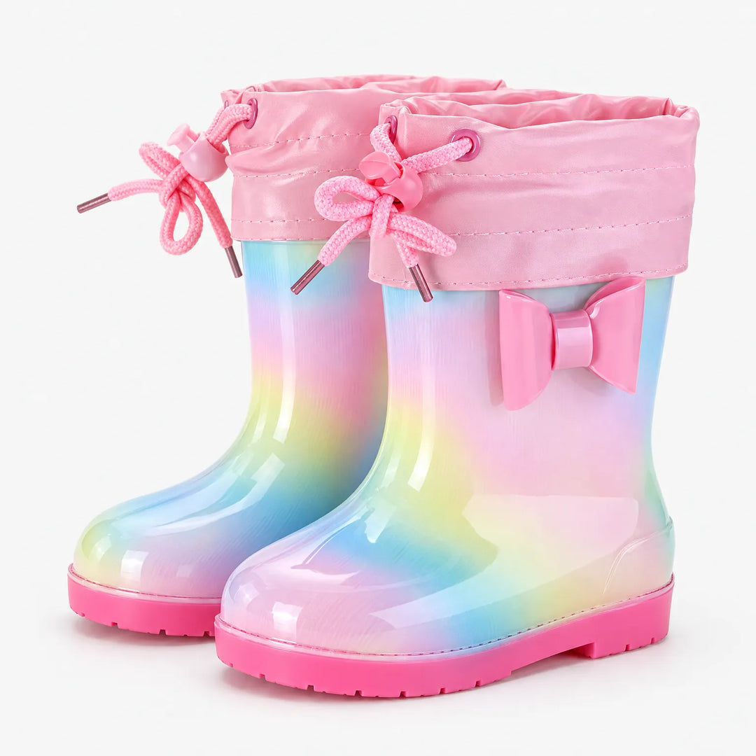 Pair of rainbow rain boots with a pink drawstring cuff tied in bows and a pink bow on the side. 10