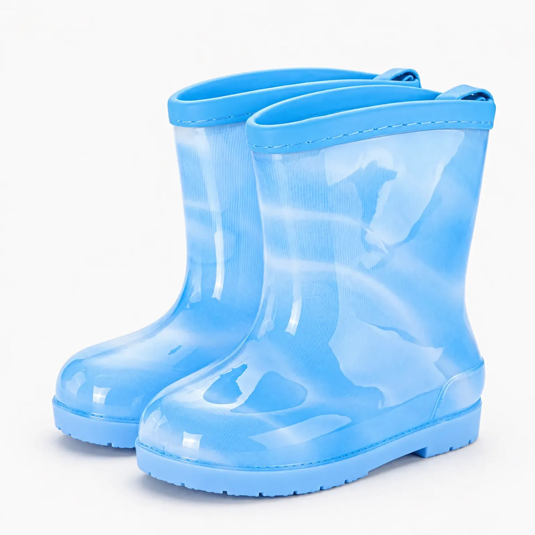 Pair of translucent light blue rain boots with a plain blue trim at the opening and pull loops at the back. 14