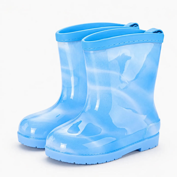 Pair of translucent light blue rain boots with a plain blue trim at the opening and pull loops at the back. 14