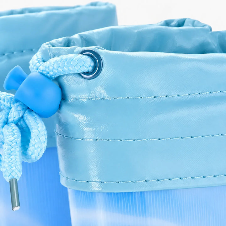Close-up of the blue boot's stitched drawstring cuff with metal eyelet, braided cord and blue cord lock. 6