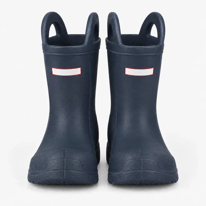 Front view of a second pair of navy blue rain boots with top handles and ridged soles. 10