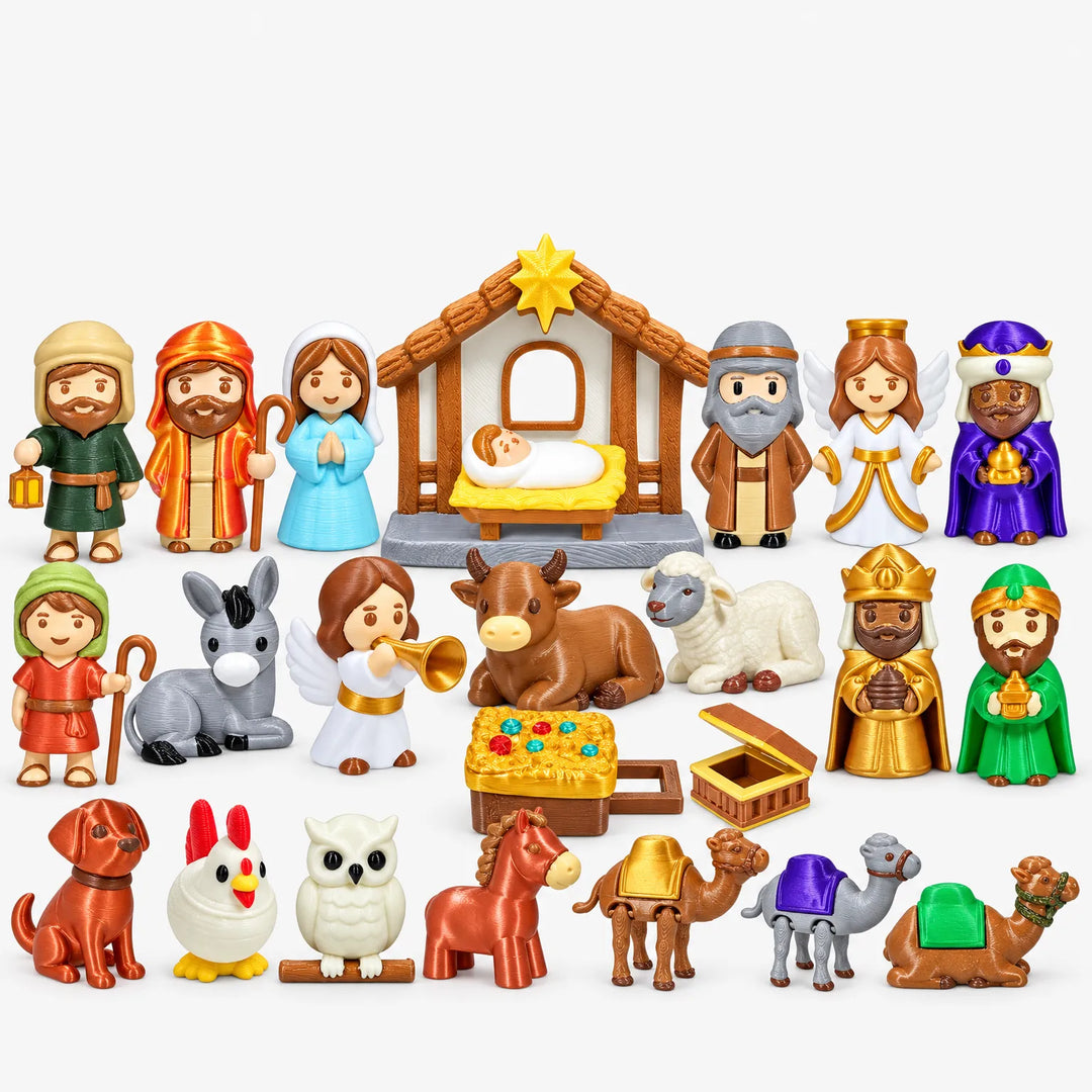 All the colorful 3D printed nativity pieces laid out together: stable, holy family, angels, wise men, shepherds and animals 2