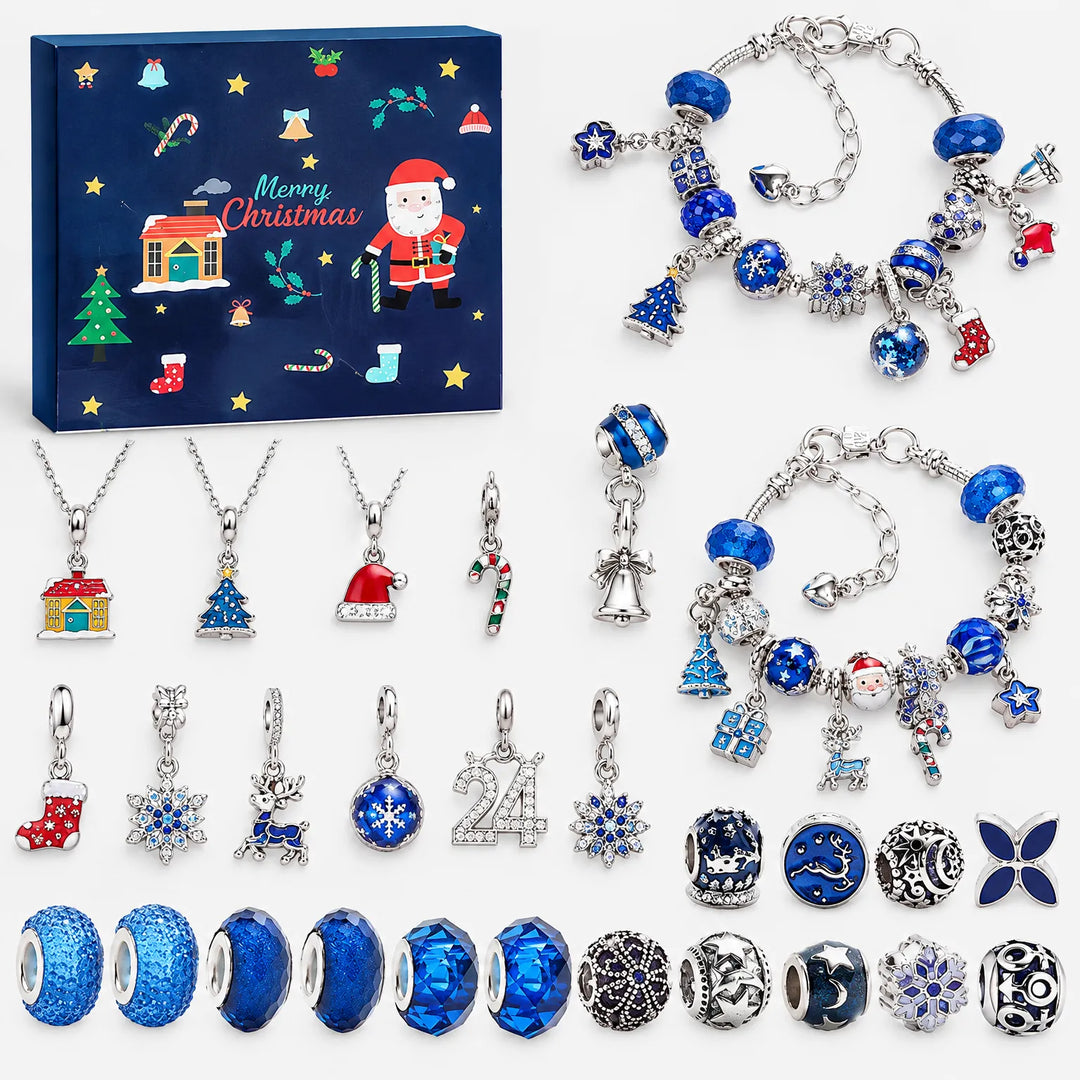 Navy blue set flat lay: boxed calendar, two blue bracelets, three necklaces, and loose house, tree, candy cane, reindeer charms and blue beads. 11