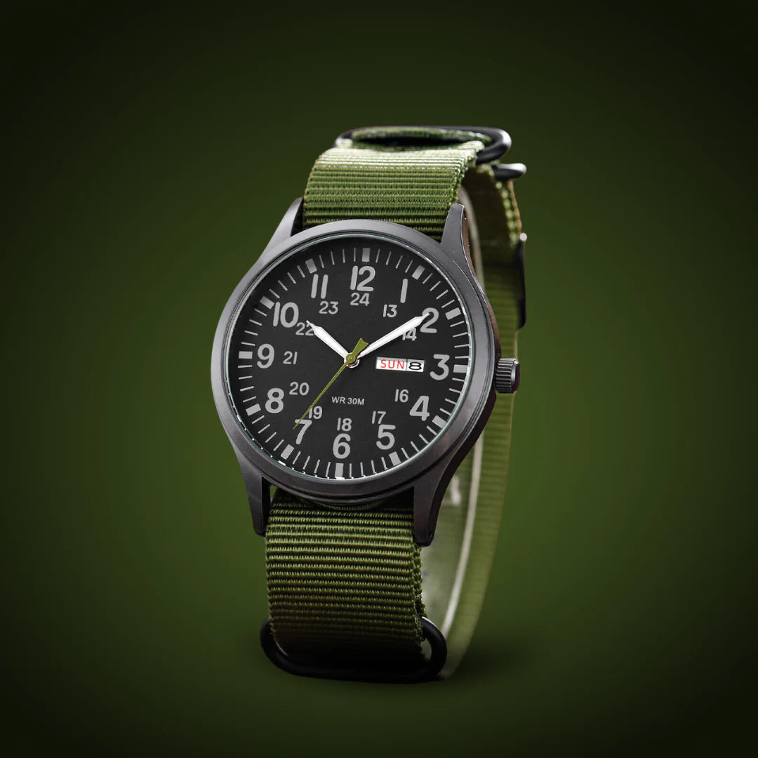 Men's field watch with a black dial and olive green woven strap, another view.