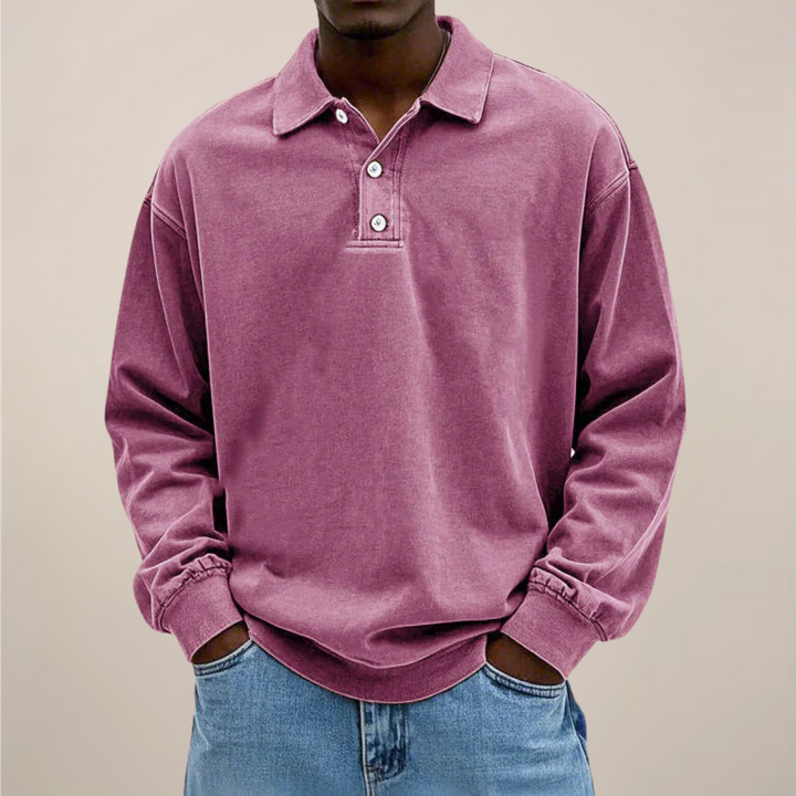 Men's relaxed-fit long sleeve polo in washed dusty pink, front view.