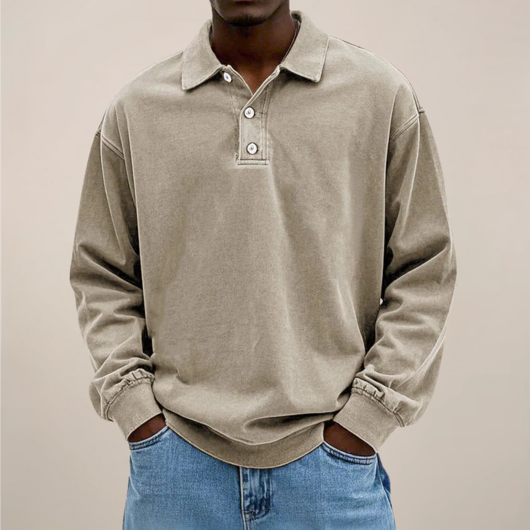 Men's relaxed-fit long sleeve polo in washed khaki beige, front view.