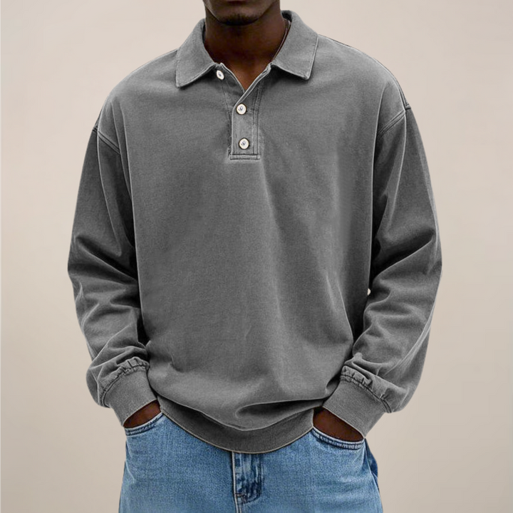 Men's relaxed-fit long sleeve polo in washed gray, front view.