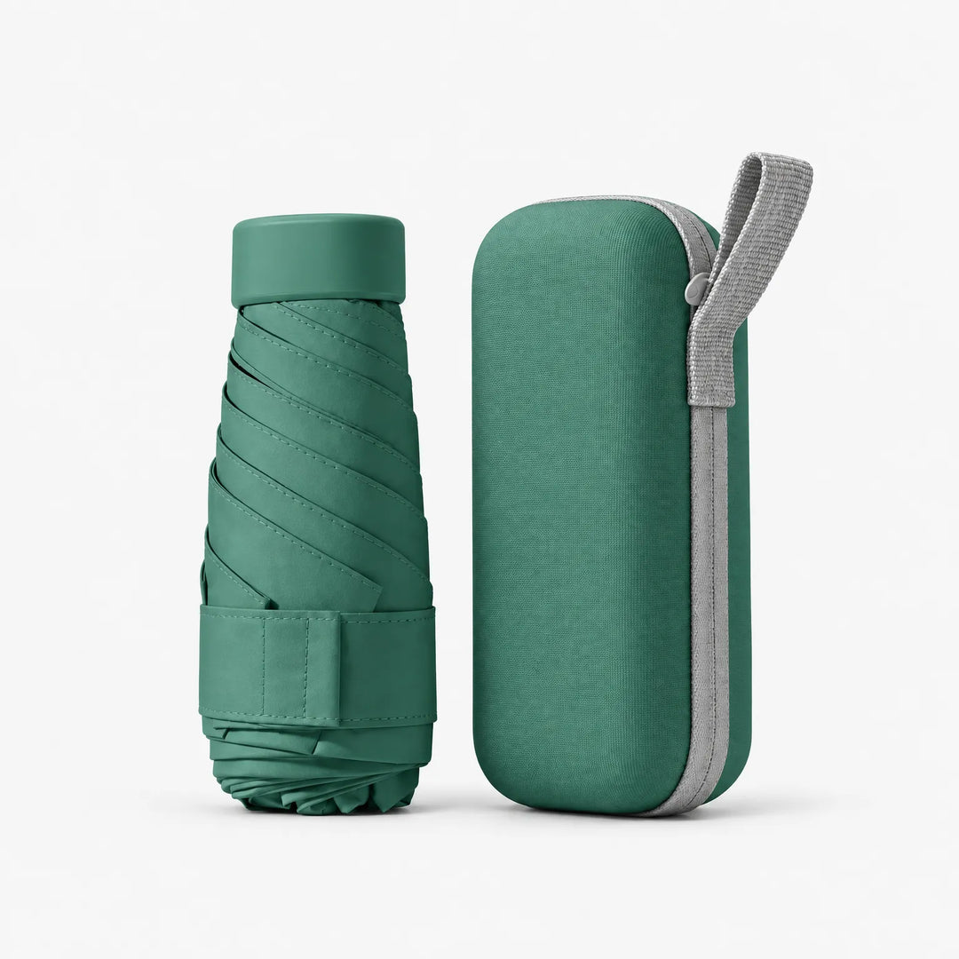 Folded dark green umbrella with cap and strap beside its matching green hard zipper case with a light gray carrying loop. 14