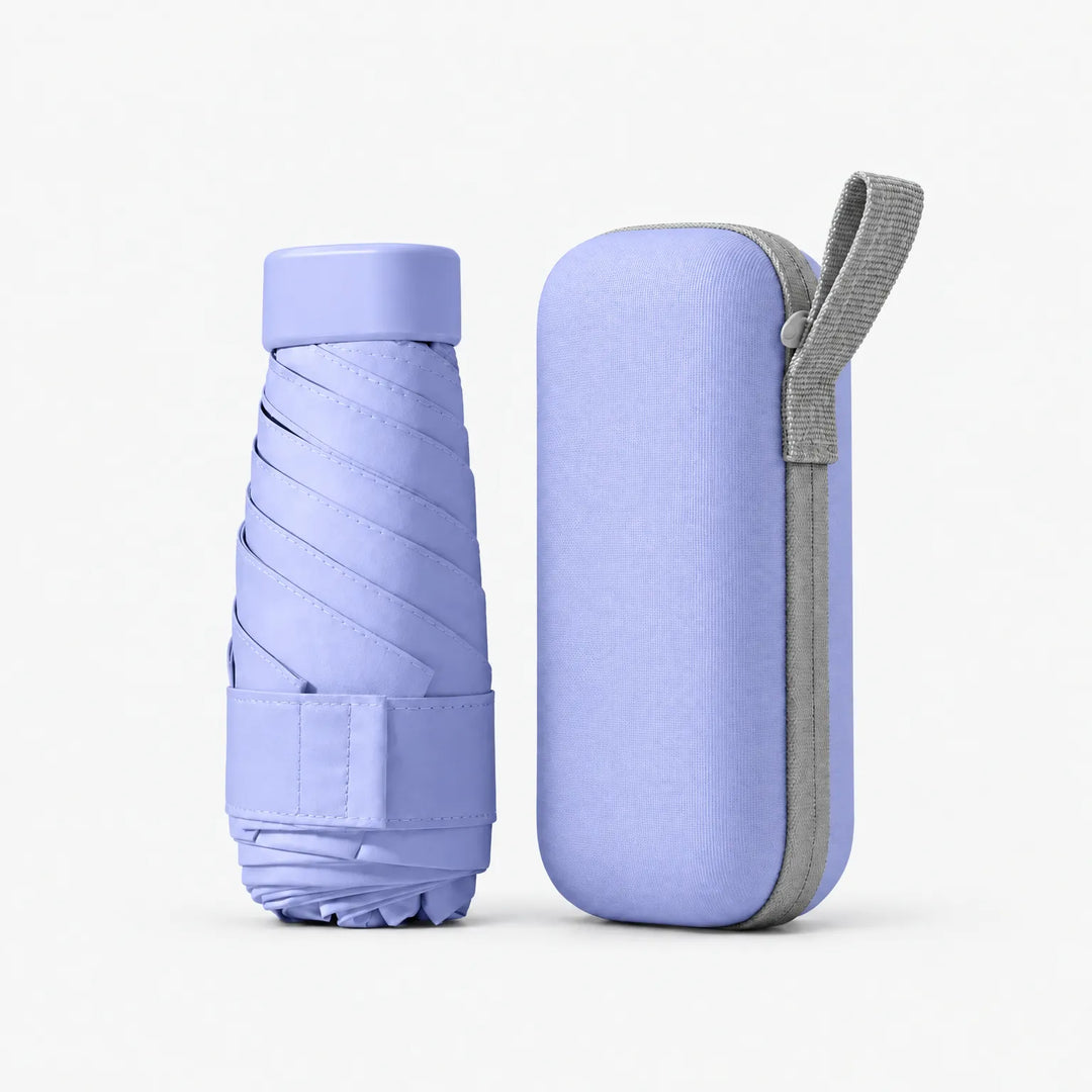 Folded lavender umbrella with its cap and strap standing beside the matching lavender zippered case with a gray loop. 7