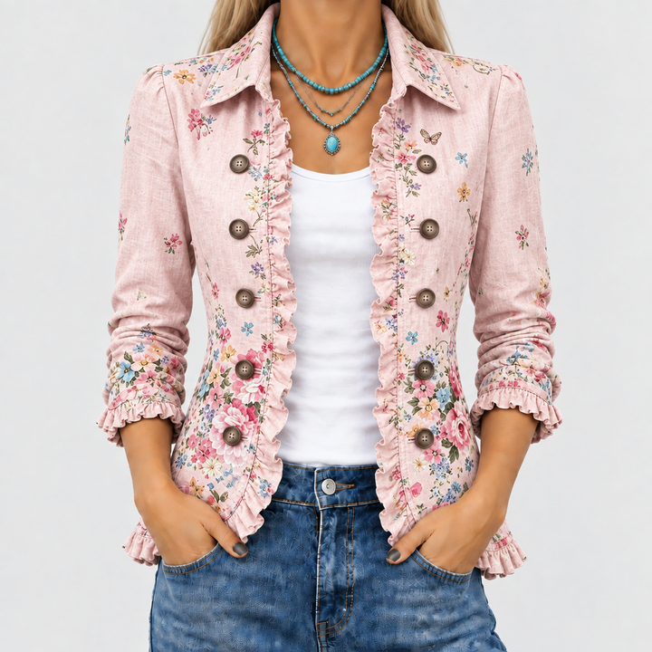 Close-up of the pink floral jacket worn open over a white tank top, showing ruffled edges and buttons 1