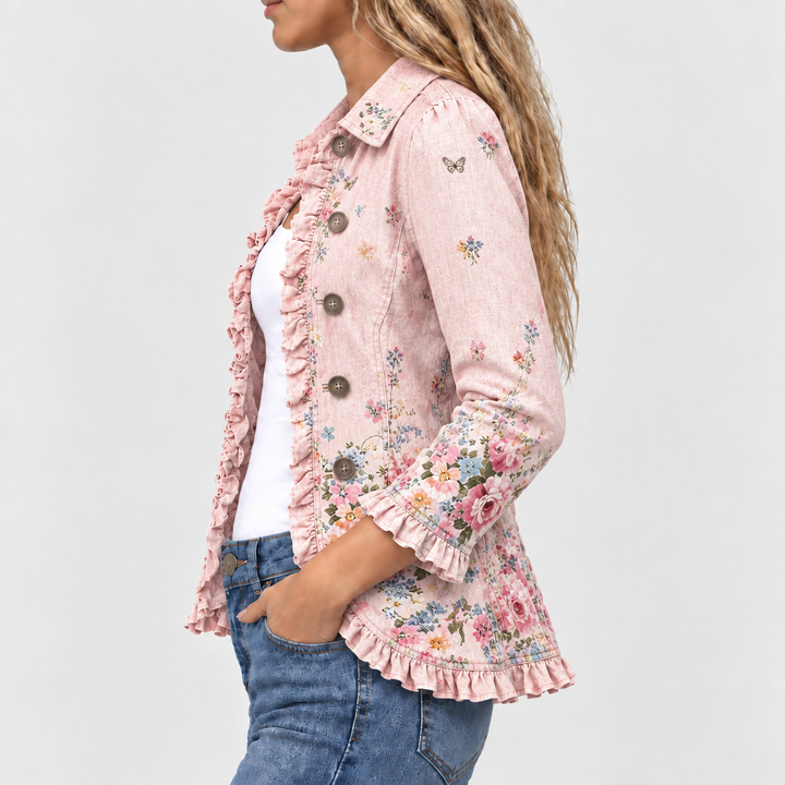 Side view of the pink floral jacket, showing the ruffled front edge, buttons, and ruffled sleeve cuff 3