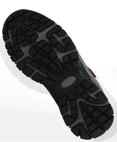 Underside of a boot showing the black outsole with deep gray-accented tread pattern 3