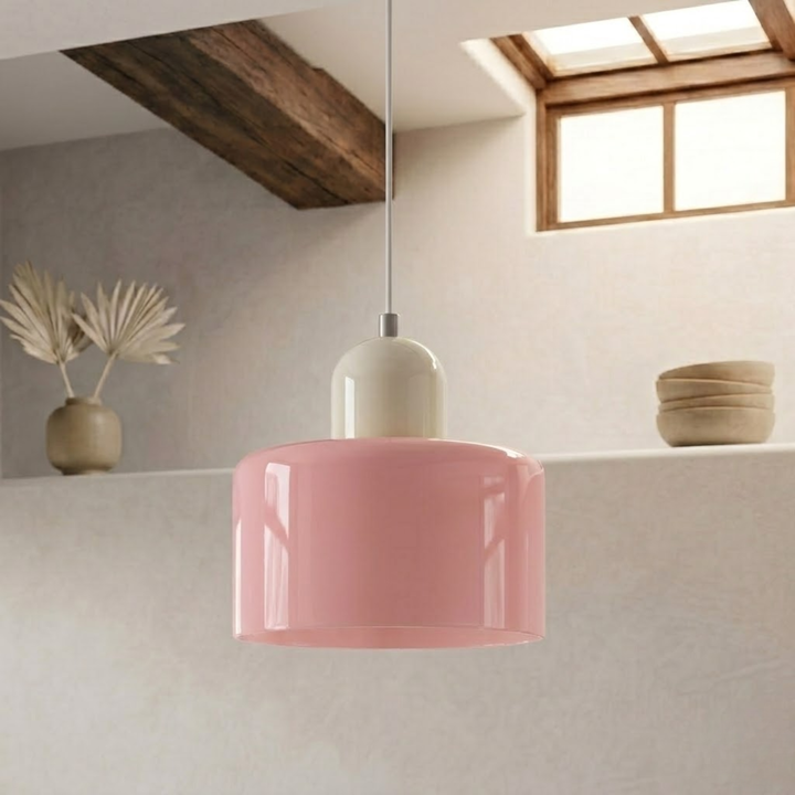 Pink drum pendant with a cream-white cap, hung from a white cord in a minimalist plastered room. 6