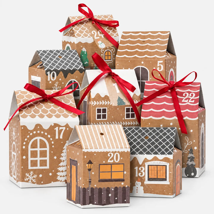 Set of numbered kraft paper village boxes with patterned roofs and red satin ribbons, shown on a plain white background. 2