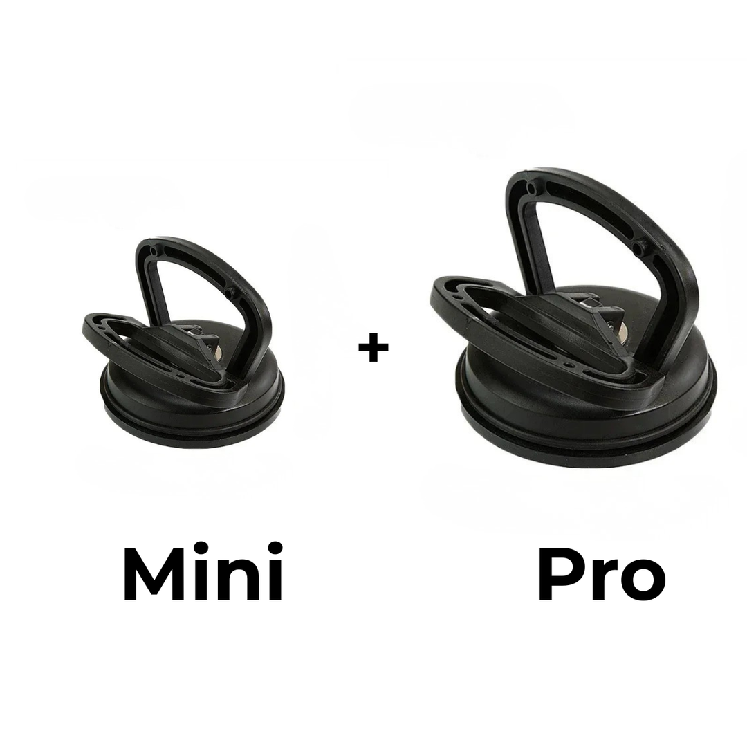 Black small and larger suction dent pullers side by side, the larger one with a taller handle and wider cup.