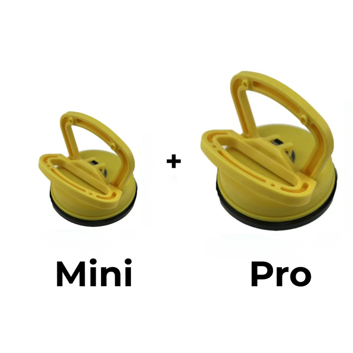 Yellow small and larger suction dent pullers side by side, the larger one with a taller handle and wider cup.
